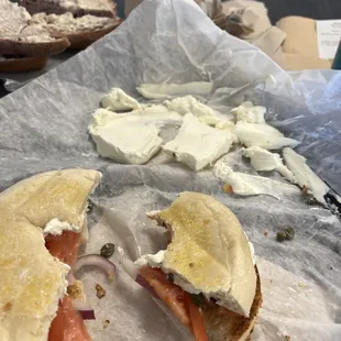 Los bagel and the cream cheese I had to scrape off to make it even slightly edible.