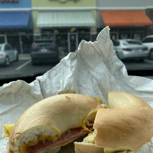 NJ TPR (Taylor pork roll) with scrambled egg. Bite a Bagel store front in the background.