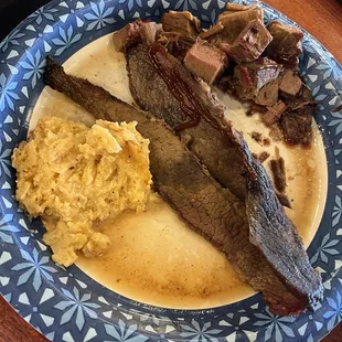 Burnt ends, brisket and cheesy potatoes.