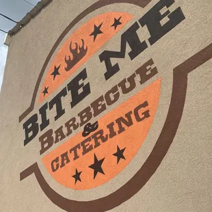 a sign on the side of a building