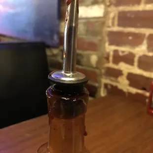 This spout may work on liquor and oil but not on bbq sauce