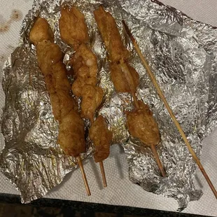 Dry salty chicken kabobs, fried on skewers, not char-grilled.
