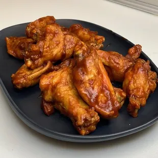 Bone-In Traditional Wings, pictured with BBQ Sauce