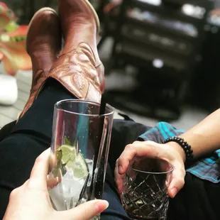 Mai Tai lounging on couches upstairs