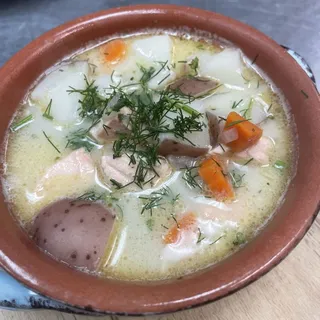 Finnish Style Salmon Soup with Potatoes Carrots Onions and touch of cream