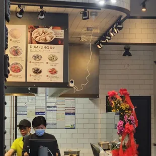 a man and a woman in a restaurant