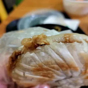 Rougamo/Roujiamo/肉夹馍. Cheap and tasty but lacking the proper texture.