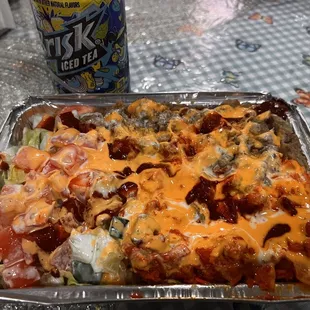 This is CC. COMBO SALAD with rice (rice is underneath the meat)