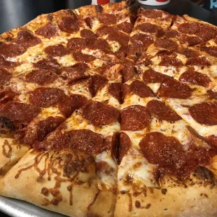 The family-size, pepperoni pizza at Bits &amp; Pizzas is huge and pretty darn tasty! Especially due to the fact that we were starving!