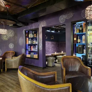 a bar with purple walls