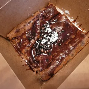 Brownie crepe with Nutella. Oreos and chocolate syrup.