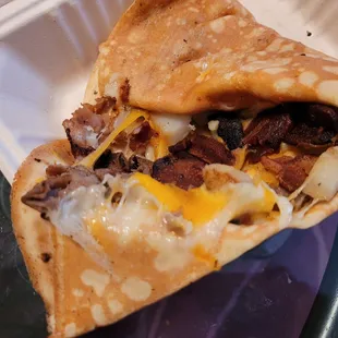 Build your own crepe stuffed with fillings, cheddar, mozzarella, beef, bacon, mushrooms.