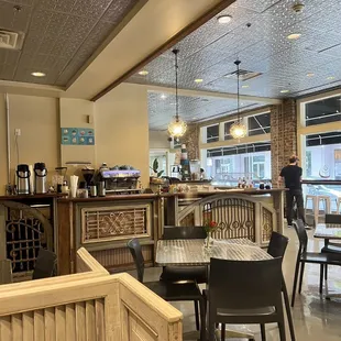 a restaurant with tables and chairs