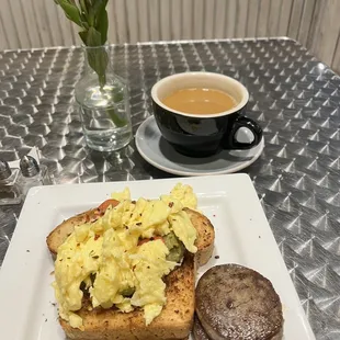 Avocado toast with sausage and dark roast coffee. Tasty!