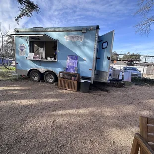 Trailer sits just to your right when you walk into the fenced off area from the parking lot.