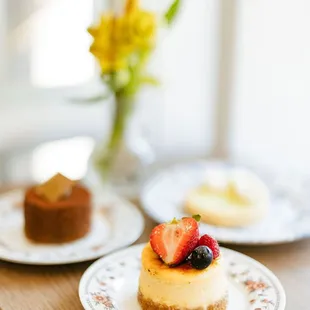 two desserts on plates