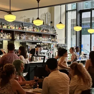 people sitting at a bar