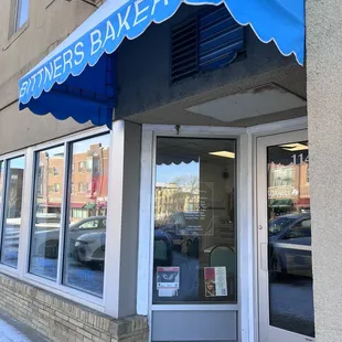 the entrance to the bakery