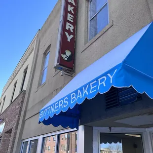 a blue awning on a building