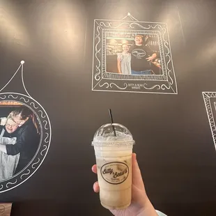 Iced vanilla latte with whipped cream