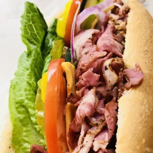 Pastrami sandwich fully loaded way more meat than any orher place