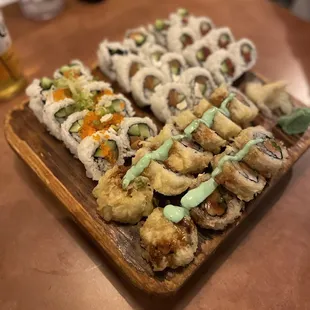 Clockwise from top right: spicy tuna, Rocky Mountain, new Michigan, Philadelphia
