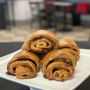 a plate of cinnamon rolls