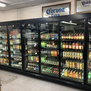 a display of beer in a cooler