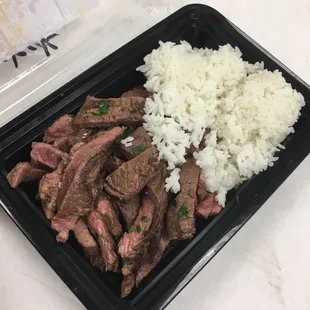 8oz steak 6oz white rice  I order the steak in bulk and add my own rice .
