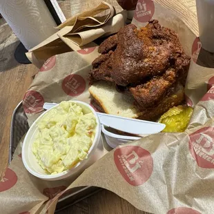 Breast quarter hot with potato salad.