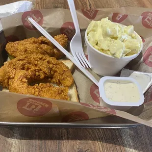 Hot chicken tenders and potato salad