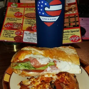 Italian submarine sandwich and pepperoni, sausage mushroom pizza