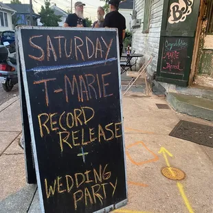 a sign for a wedding party