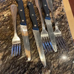 four knives and a fork