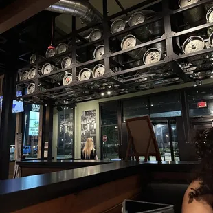 a woman sitting at the bar