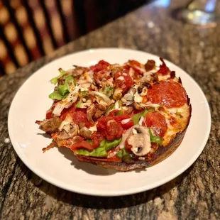 Mini deep dish pizza &quot;Bj&apos;s Favorite&quot; - meatballs, pepperoni, italian sausage, mushrooms, green bell peppers, onion,seasoned tomatoes