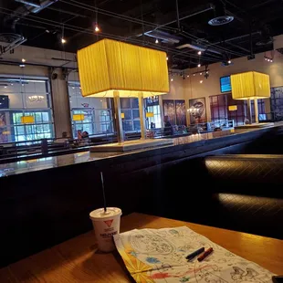 a table with a map and a cup of coffee