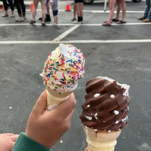 Small cones dipped in rainbow sprinkles and chocolate dip.