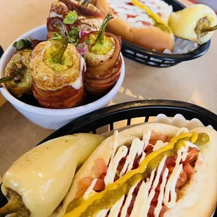 a hot dog with bacon wrapped in bacon and mustard