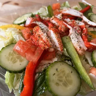 a salad in a plastic container
