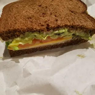 Avocado &amp; 3 cheese sandwich on squaw bread.