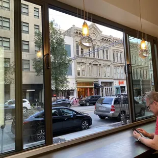 Windows open to street.