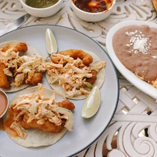 Fish Tacos served with Rice and Beans