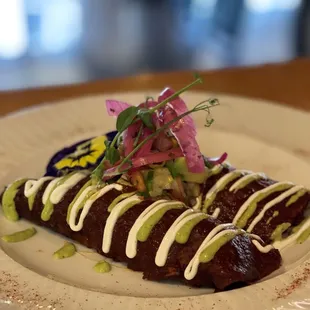 a plate of food on a wooden table