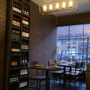 a table and chairs in a wine shop