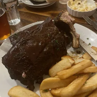 Dry ribs. Oddly smoky tasting fries, terrible Mac and cheese, fantastic soup bowl in the back.