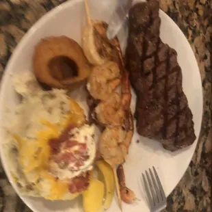 NY Strip with loaded mashed potatoes and grilled shrimp.