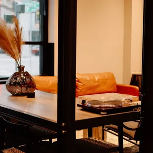 a table and chairs in a coffeehouse