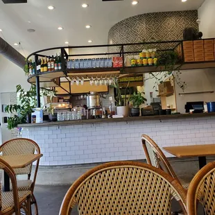 a view of the bar and dining area