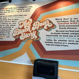 a wall with a quote on it